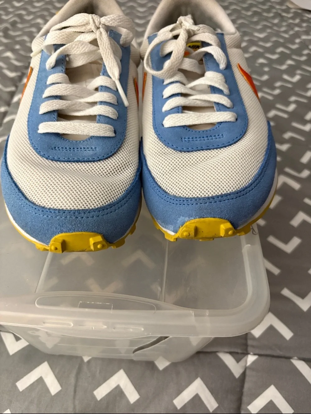Nike Kids White Sneakers with Light Blue Panels and Orange Swoosh